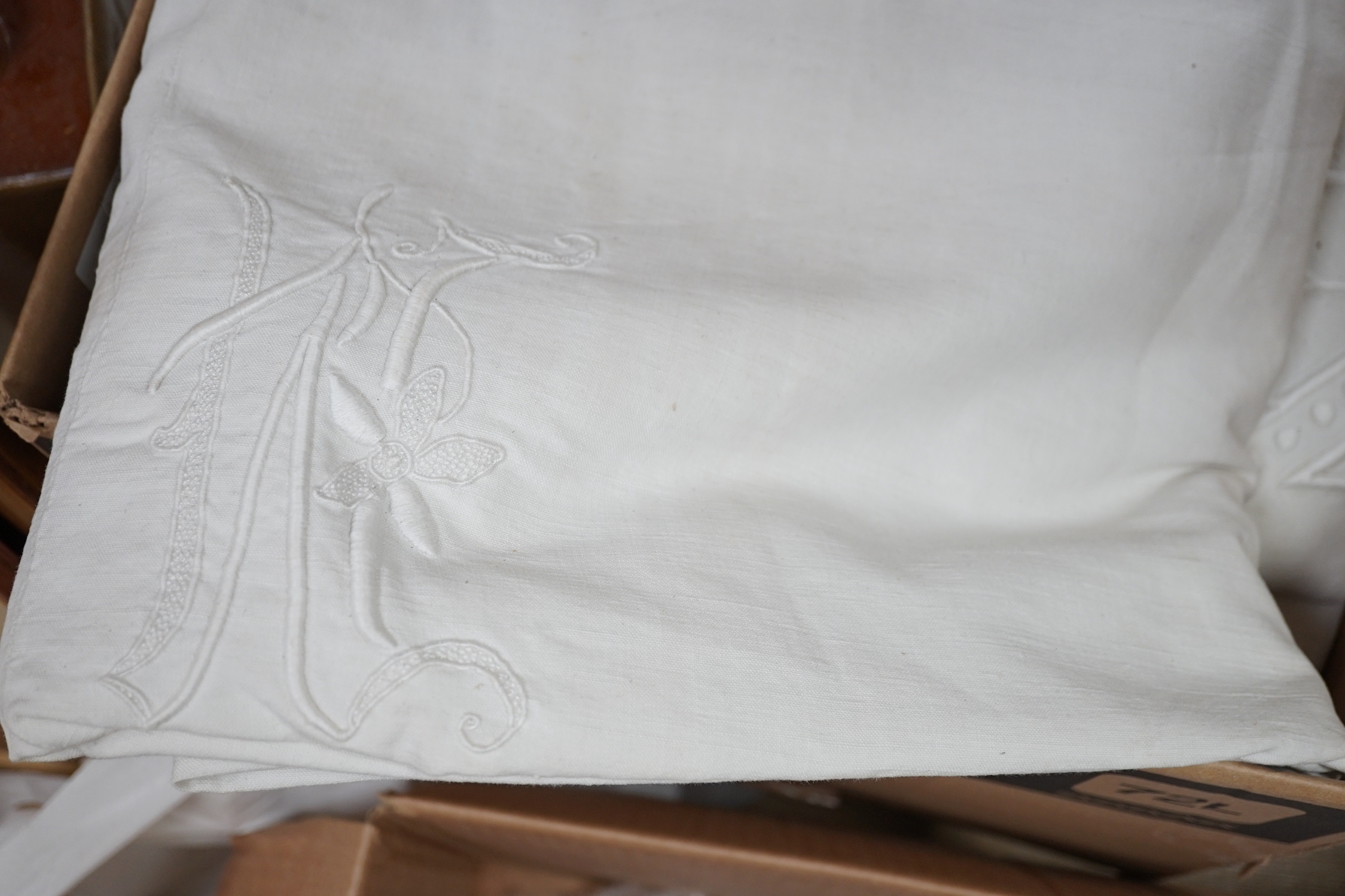 Twelve 19th / 20th century, coarse woven monogrammed sheets